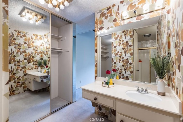 6542 Ocean Crest Dr Unit C-309, Rancho Palos Verdes, CA 90275 - bathroom featuring a shower stall and a textured ceiling