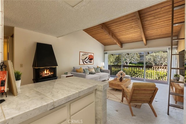 6542 Ocean Crest Dr Unit C-309, Rancho Palos Verdes, CA 90275 - living room with light carpet, wooden ceiling, and a lit fireplace