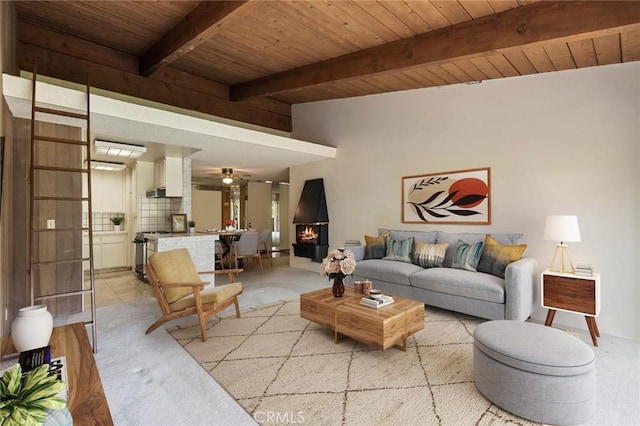 6542 Ocean Crest Dr Unit C-309, Rancho Palos Verdes, CA 90275 - living area with a wooden ceiling with exposed beams, light colored carpet, and a ceiling fan
