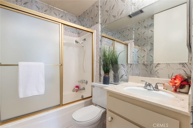 6542 Ocean Crest Dr Unit C-309, Rancho Palos Verdes, CA 90275 - bathroom with wallpapered walls, vanity, and bath / shower combo with glass door