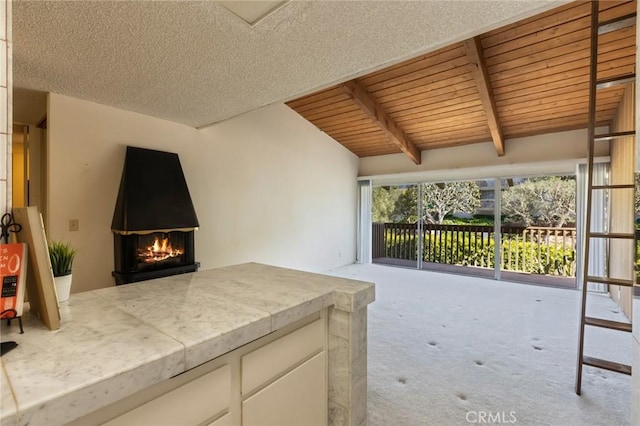 6542 Ocean Crest Dr Unit C-309, Rancho Palos Verdes, CA 90275 - view of patio / terrace featuring a warm lit fireplace and an outdoor kitchen