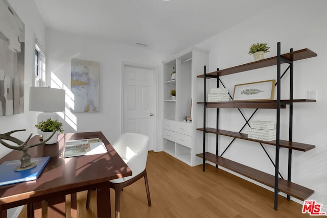 dining area featuring hardwood / wood-style flooring