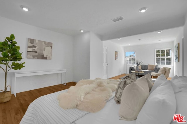 bedroom with wood-type flooring