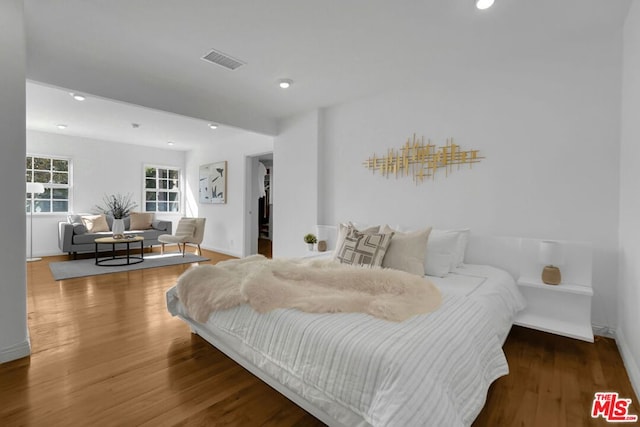 bedroom featuring hardwood / wood-style flooring