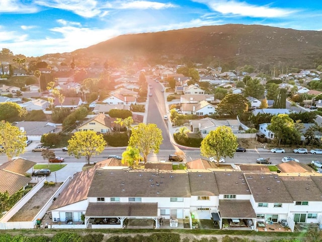 birds eye view of property featuring a mountain view