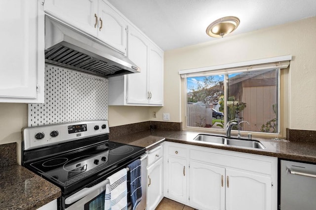 kitchen featuring backsplash, sink, white cabinets, and stainless steel electric range