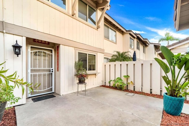 property entrance with a patio