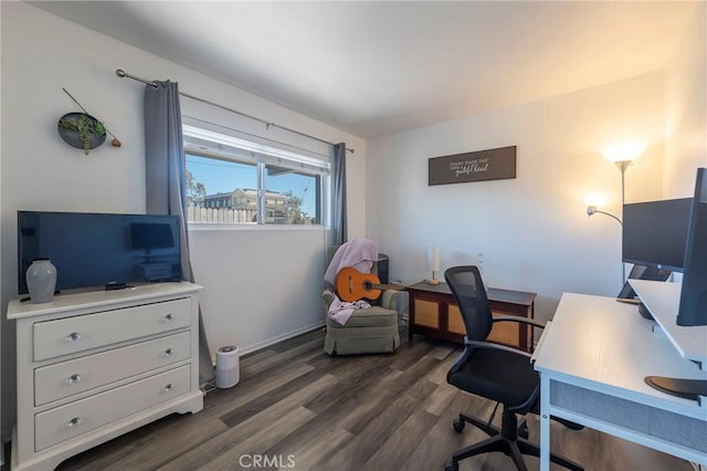 office space with dark wood-type flooring