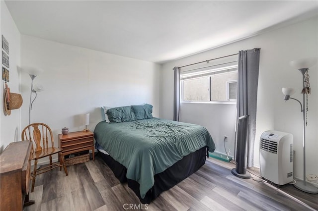 bedroom featuring hardwood / wood-style floors