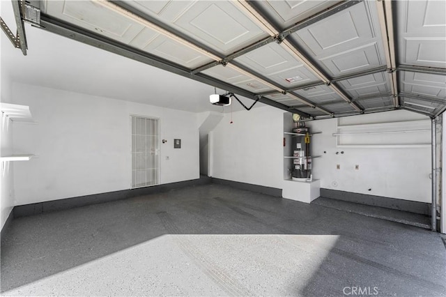 garage featuring water heater and a garage door opener