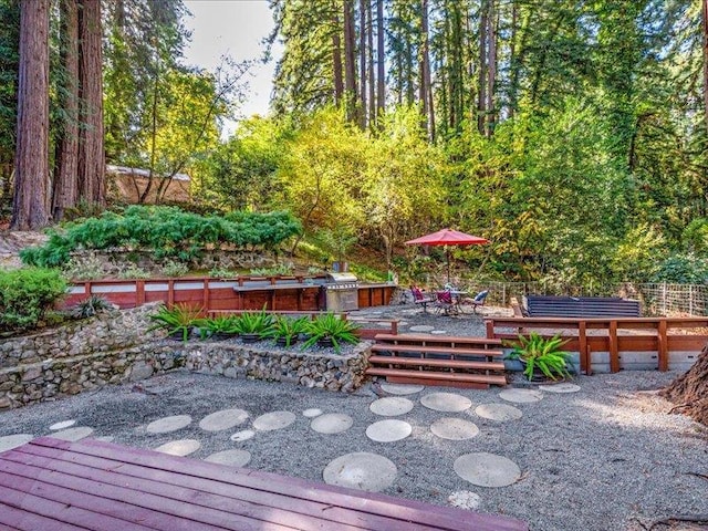 exterior space featuring a patio and a deck