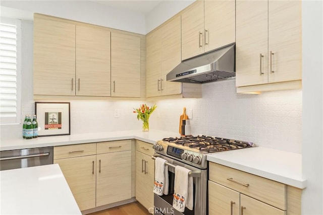 kitchen featuring light brown cabinets and stainless steel appliances