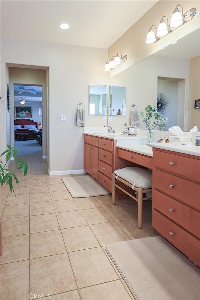 bathroom featuring tile patterned floors and vanity