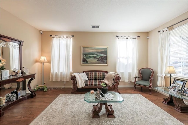 living area featuring dark hardwood / wood-style flooring