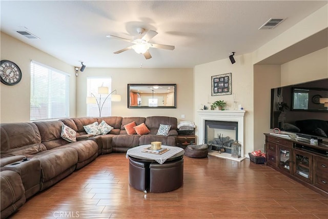 living room featuring ceiling fan