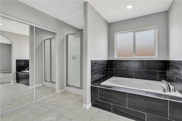 bathroom featuring plus walk in shower