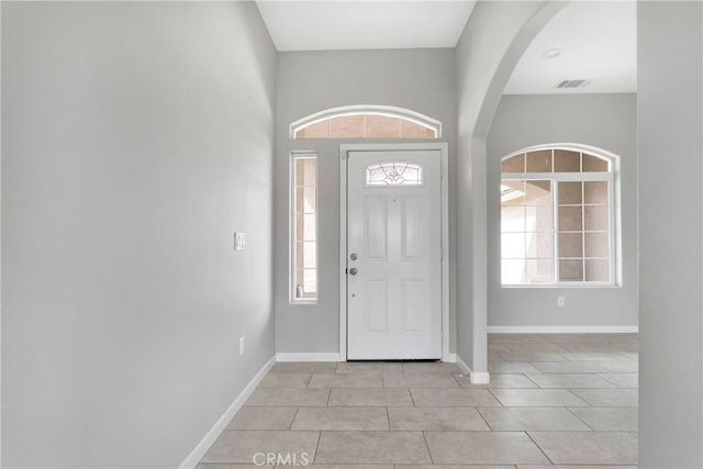 entrance foyer featuring light tile patterned floors