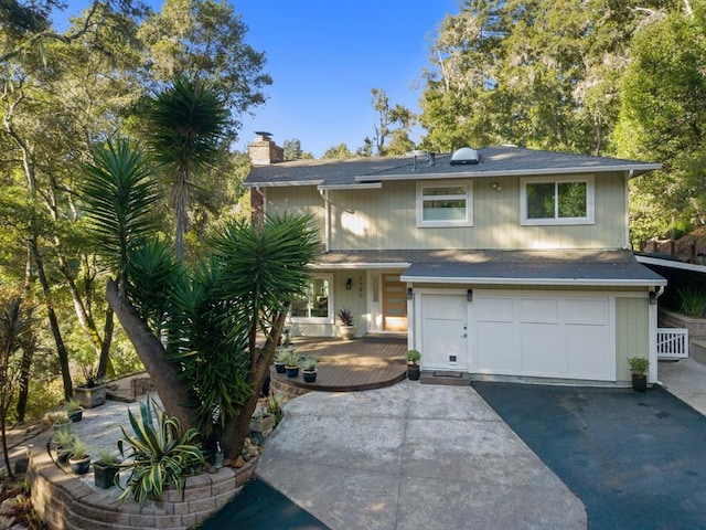 view of front of property with a garage