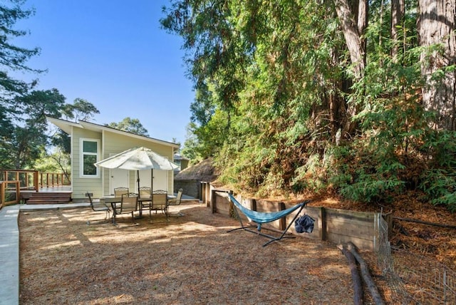 view of yard with a wooden deck