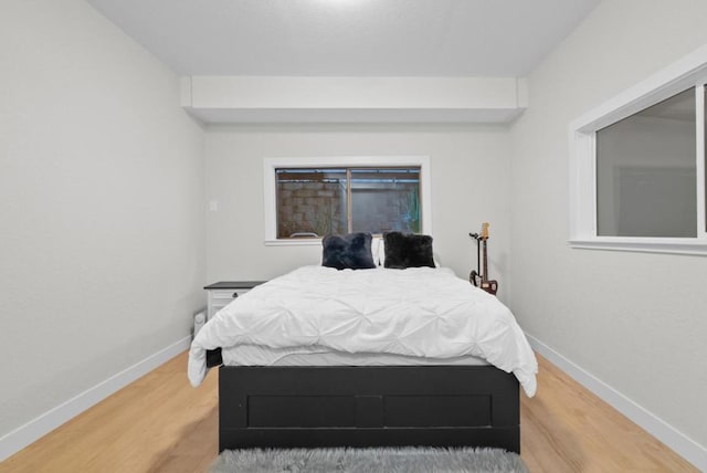 bedroom featuring hardwood / wood-style floors