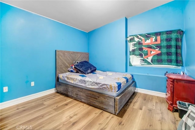 bedroom featuring light hardwood / wood-style floors