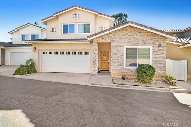 view of front of property featuring a garage