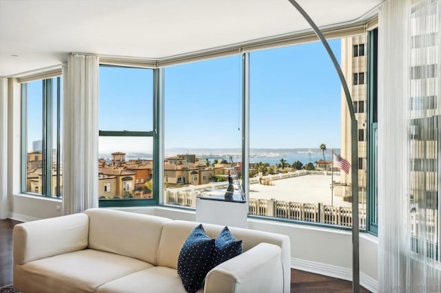 interior space featuring a wealth of natural light and a water view