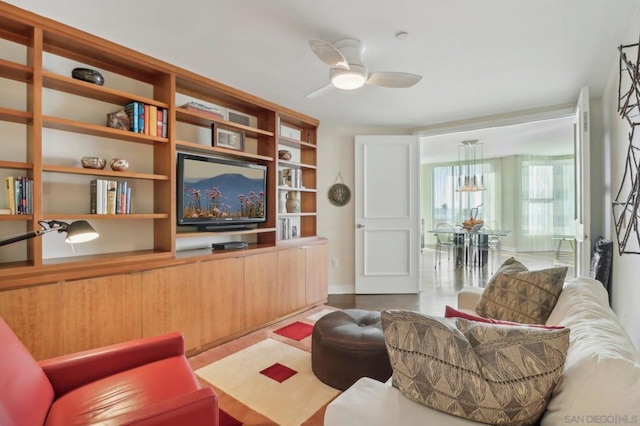 living room featuring ceiling fan