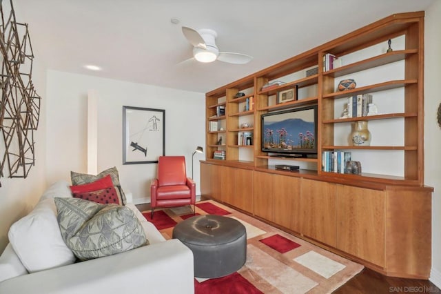 living room featuring ceiling fan