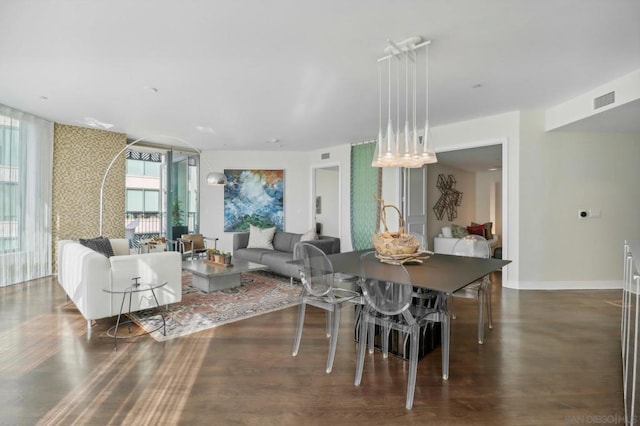 dining area featuring dark hardwood / wood-style floors