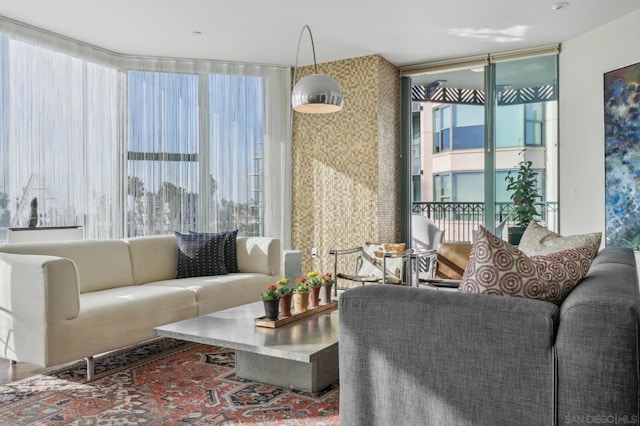 living room with floor to ceiling windows