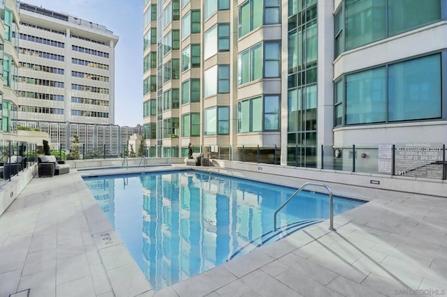 view of pool with a patio area