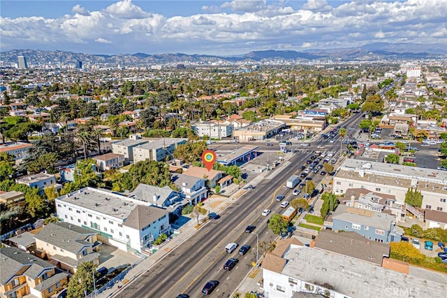 drone / aerial view featuring a mountain view