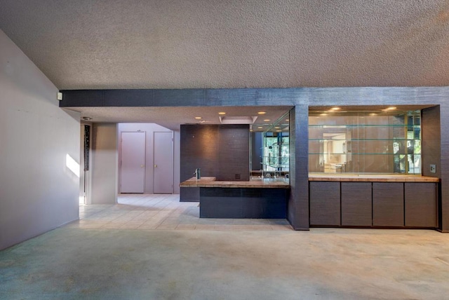 kitchen with light colored carpet