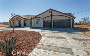 ranch-style home with a garage