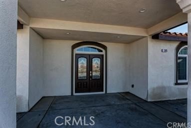 doorway to property with french doors