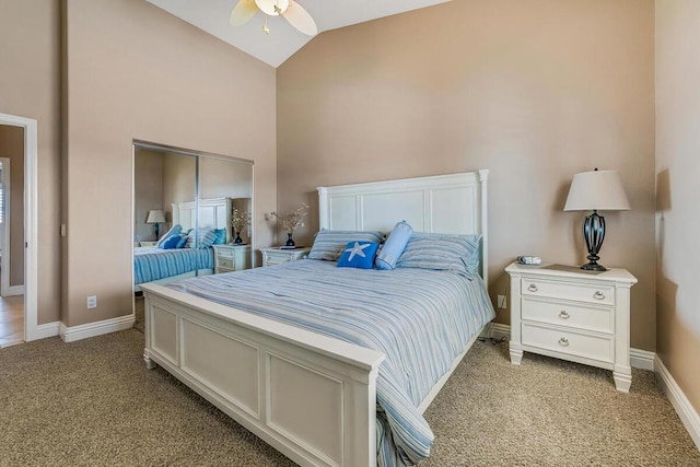 bedroom with ceiling fan, light carpet, and lofted ceiling