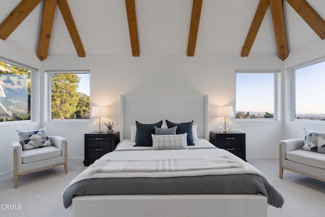 bedroom with beam ceiling, carpet floors, and high vaulted ceiling