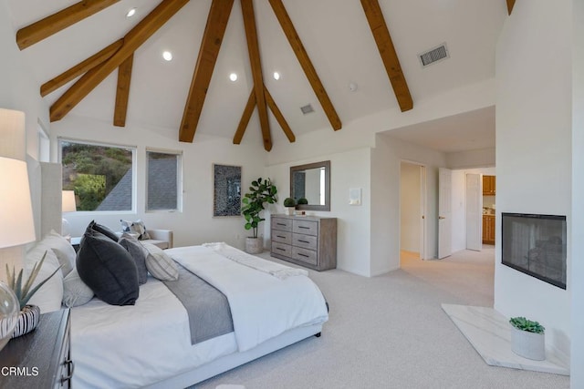 bedroom featuring beamed ceiling, light colored carpet, high vaulted ceiling, and multiple windows