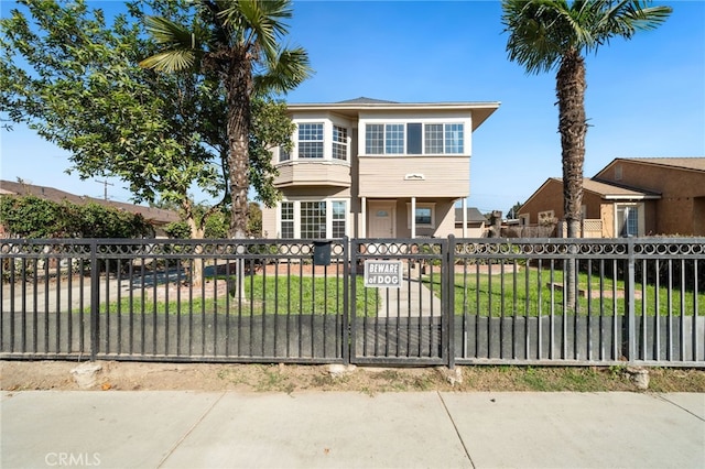 view of front of home featuring a front lawn