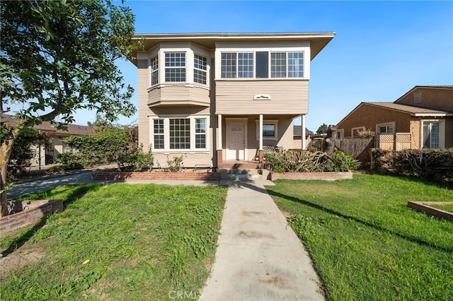 view of front facade with a front lawn