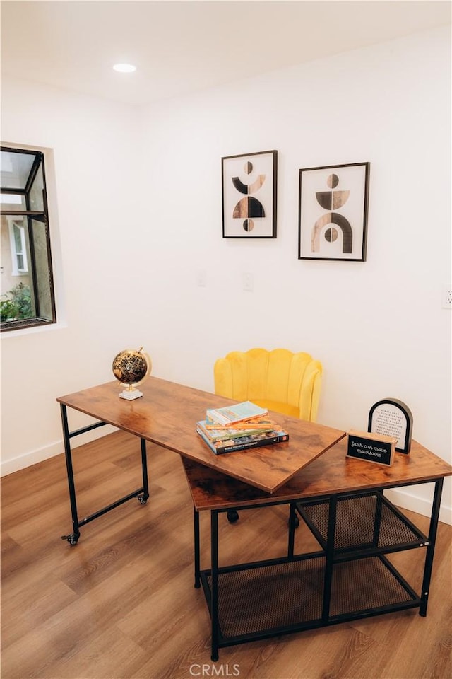 dining space featuring light wood-type flooring