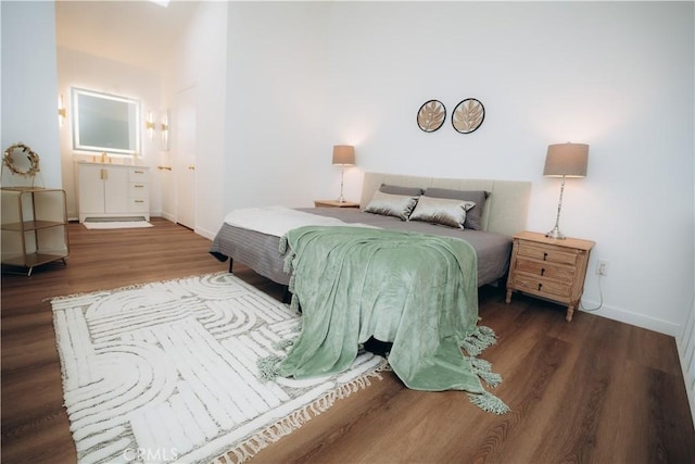 bedroom featuring dark hardwood / wood-style floors