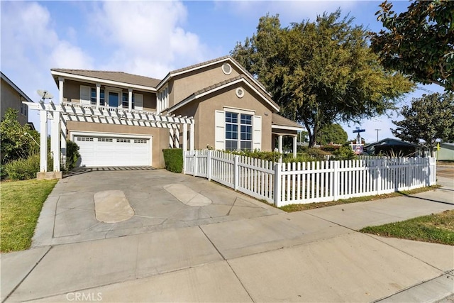 view of front of property featuring a garage