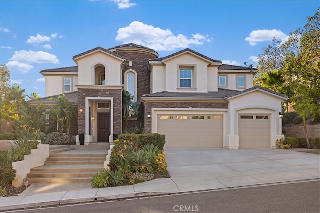 view of front of home with a garage