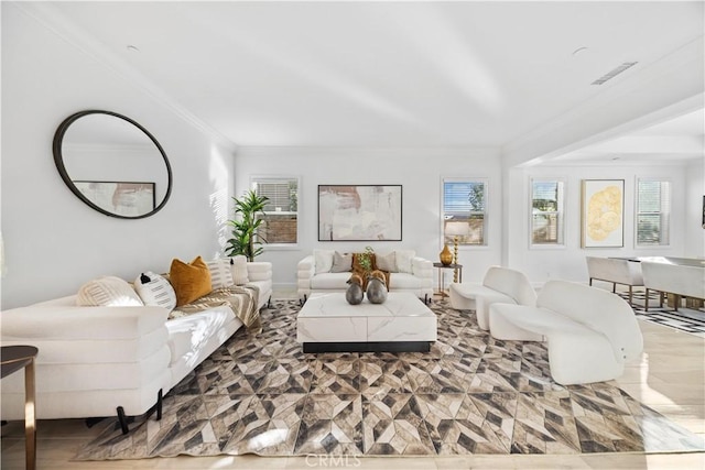 living room with ornamental molding