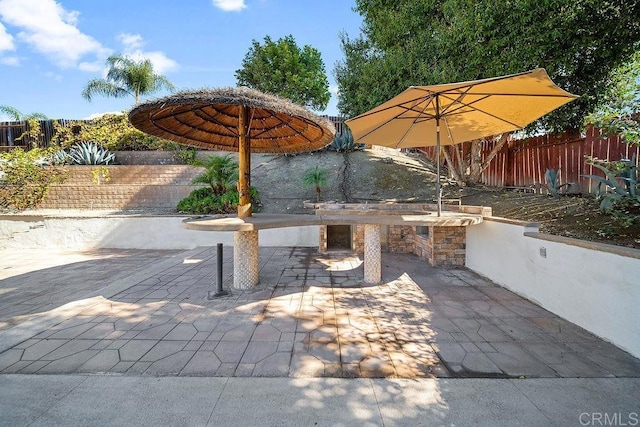 view of patio with an outdoor kitchen