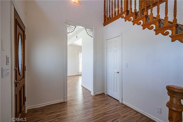 foyer entrance featuring hardwood / wood-style flooring