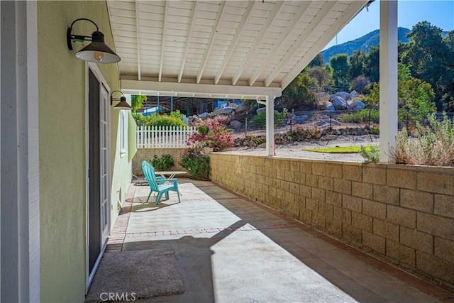 view of patio with a mountain view