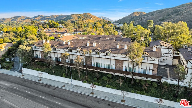 drone / aerial view featuring a mountain view